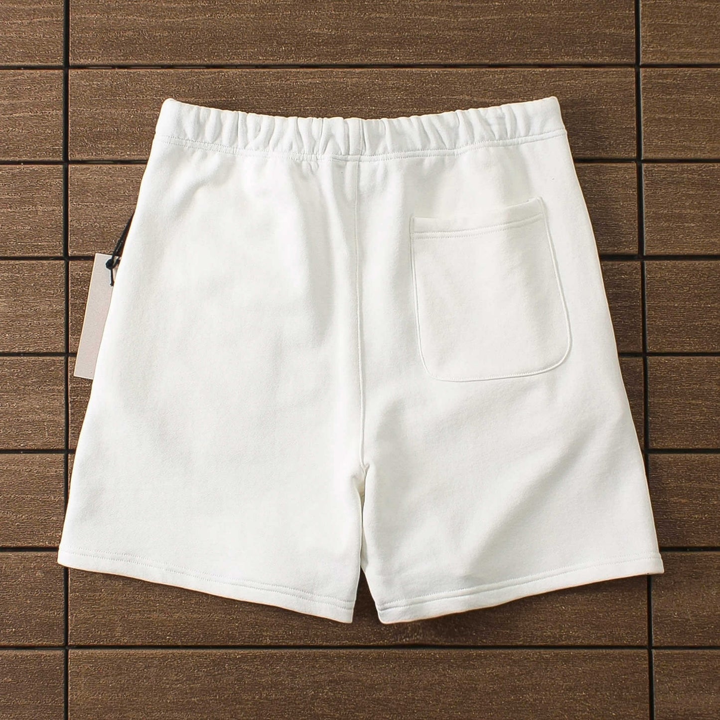 "essence" shorts white